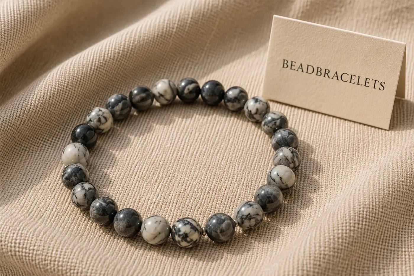 ASH — Netzjaspis, grau-Perlenarmband, 5–7 mm, auf Leinen