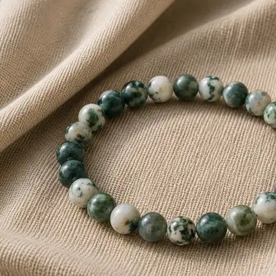 FOREST — Baumachat-Perlenarmband auf Leinen