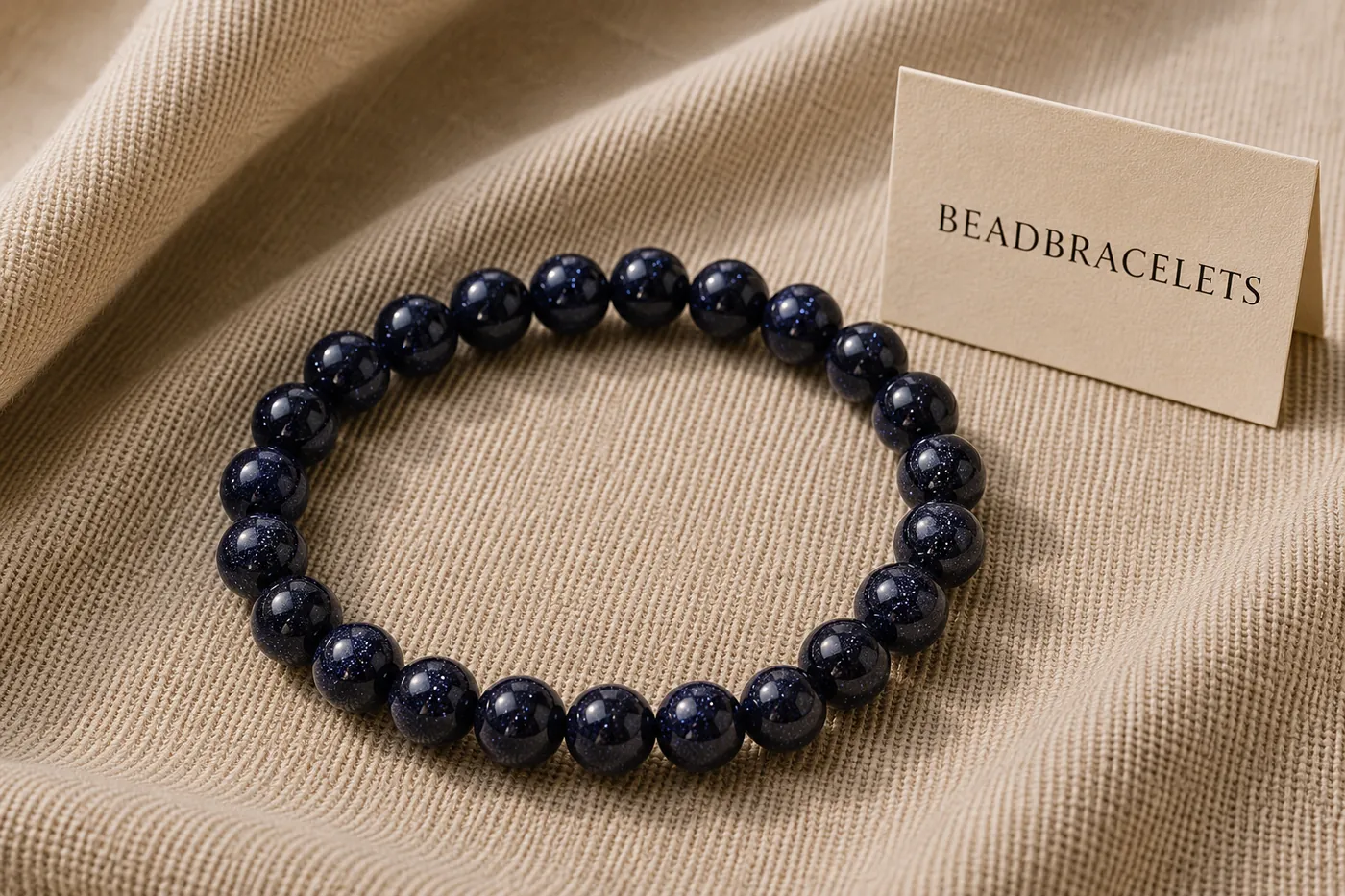MIDNIGHT — Blaufluss-Perlenarmband, 5–7 mm, auf Leinen